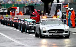 High-performance Safety Car On Racetrack Wallpaper