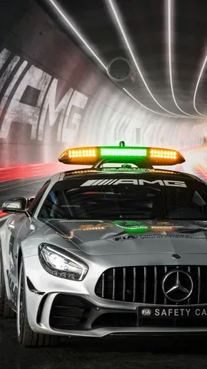 High-performance Safety Car On The Racetrack Wallpaper
