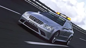 High-performance Safety Car On The Racetrack Wallpaper