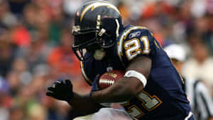 High-powered Nfl Running Back In Action Wallpaper