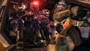 High-resolution Wallpaper Featuring Halo Spartans Engaged In Thrilling Action Wallpaper