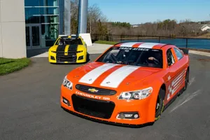 High-speed Car Racing Action Wallpaper