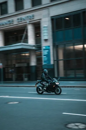 High Speed Luxury Car On The Move Wallpaper