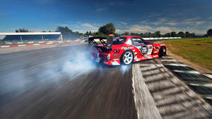 High-speed Mazda Rx-7 Drift Car In Action Wallpaper