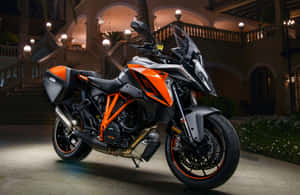 High Speed Thrill: Ktm Motorcycle In Action Wallpaper