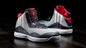 High Top Basketball Shoes Red Black Accents Wallpaper