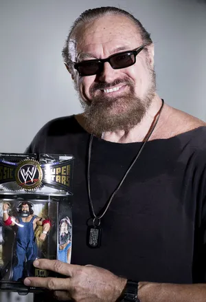 Hillbilly Jimwith Action Figure Wallpaper