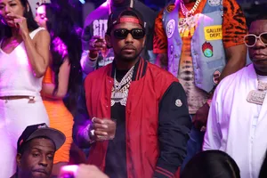 Hip Hop Artist At Club Scene Wallpaper