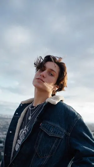 Hip-hop Artist Chase Hudson Dazzles And Charms With His Music Wallpaper