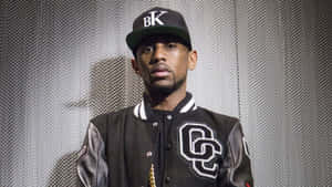 Hip Hop_ Artist_in_ B K_ Cap_and_ Jacket Wallpaper