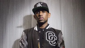 Hip Hop_ Artist_in_ B K_ Cap_and_ Jacket Wallpaper