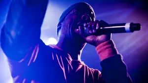 Hip Hop_ Artist_ Performance_in_ Blue_ Lights.jpg Wallpaper