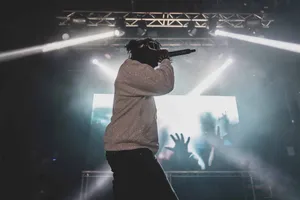 Hip Hop Artist Performing Live Concert Wallpaper