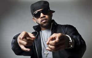 Hip Hop Artist Pointing At Camera.jpg Wallpaper