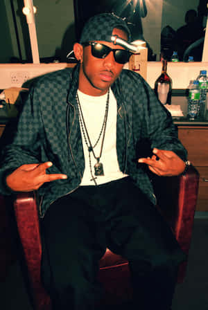 Hip Hop Artist Posing Backstage Wallpaper