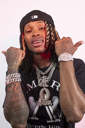 Hip Hop_ Artist_ Showing_ Off_ Jewelry Wallpaper