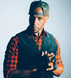 Hip Hop_ Artist_ Stylish_ Pose.jpg Wallpaper