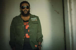 Hip Hop_ Artist_ Stylish_ Pose Wallpaper