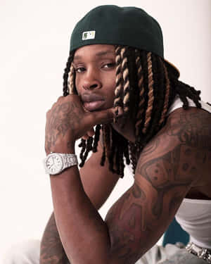 Hip Hop_ Artist_ With_ Tattoos_ And_ Watch.jpg Wallpaper