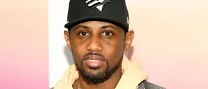 Hip Hop Artistin Black Cap Wallpaper