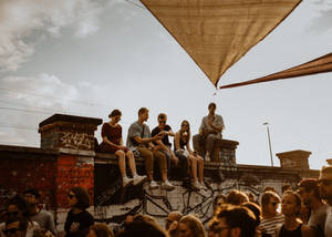 Hipster On Top Of Wall Wallpaper