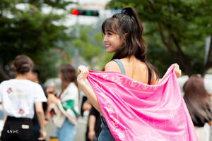 Hirai Momo Holding Pink Banner Wallpaper