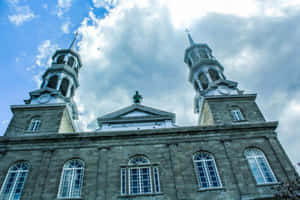 Historic Church Towers Laval Wallpaper