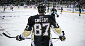 Hockey_ Player_ Number_87_ On_ Ice Wallpaper