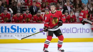 Hockey Player On Ice During Game Wallpaper