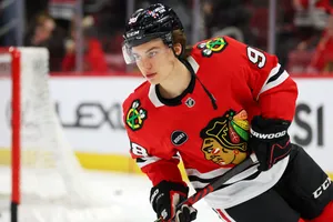 Hockey Playerin Action Blackhawks Wallpaper