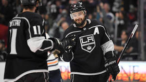 Hockey Star Drew Doughty Shares A Joyous Moment With Teammate Anze Kopitar Wallpaper