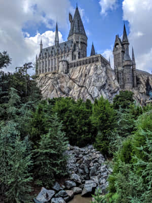 Hogwarts Castle Is On Top Of A Mountain Wallpaper