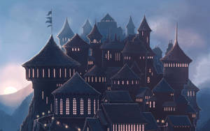 Hogwarts Castle Situated On A Hill With A Full Moon In The Night Sky Wallpaper