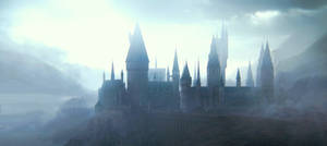 Hogwarts Castle Standing In Ethereal Splendor Wallpaper