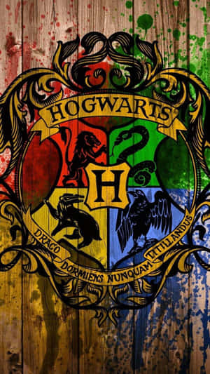 Hogwarts Crest - Emblems Of Four Hogwarts Houses Wallpaper