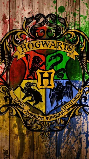 Hogwarts Crest - Emblems Of Four Hogwarts Houses Wallpaper