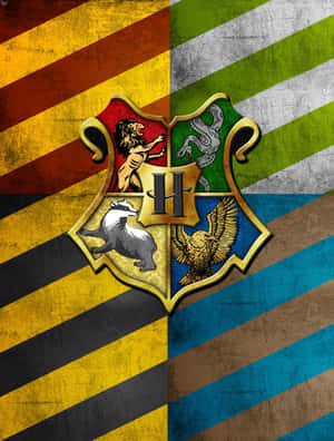 Hogwarts Crest Featuring The Four Houses Emblem Wallpaper