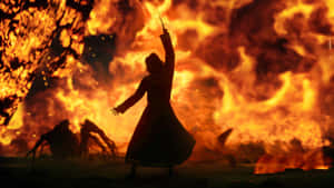 Hogwarts Legacy_ Fiery Duel_ Backlit Wizard.jpg Wallpaper