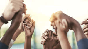 Holding Hands In Solidarity Against Racism Wallpaper