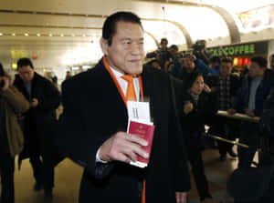 Holding Passport Antonio Inoki Wallpaper