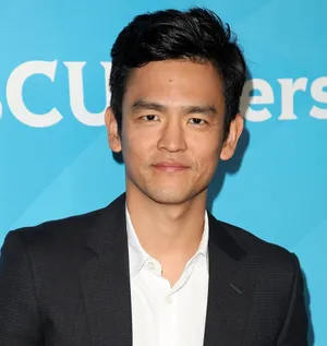 Hollywood Actor John Cho Posing For A Portrait Wallpaper