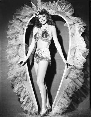 Hollywood Icon Rita Hayworth In Covergirl Costume Wallpaper