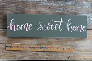 Home Sweet Home On Black Plank Wallpaper