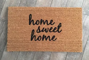 Home Sweet Home On Brown Rug Wallpaper