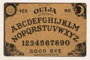 Honor The Spirits With An Engaging Ouija Board Wallpaper