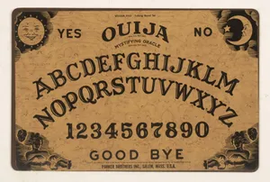 Honor The Spirits With An Engaging Ouija Board Wallpaper
