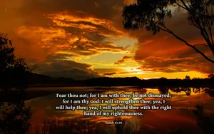 Hopeful Sunrise Over Majestic Mountains Wallpaper