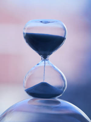 Hourglass Clock Filled With Sand Wallpaper