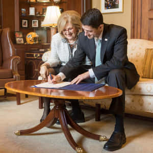 House Speaker Paul Ryan Signing Documents Wallpaper