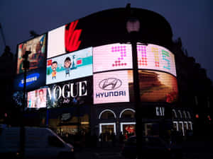 Huge Led Screens In Dark Piccadilly Circus Wallpaper